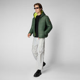 Man's animal free hooded puffer jacket Donald in thyme green | Save The Duck